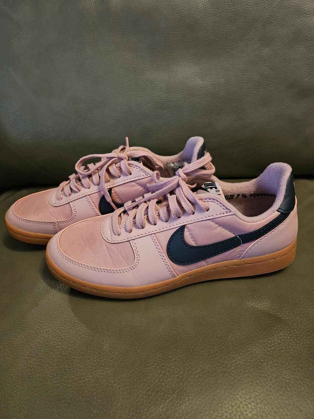 Nike Women’s Pink Low-Top Sneakers with Navy Swoosh and Gum Outsole